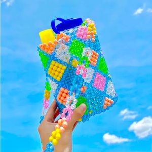 Susan Alexandra x Supergoop Bottle Bag